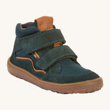 Froddo barefoot Tex Autumn children's shoe in petroleum available at Babipur. A dark turquoise shoe with 2 velcro fasteners on the front for a secure fit, padded ankle and a brown grippy sole.