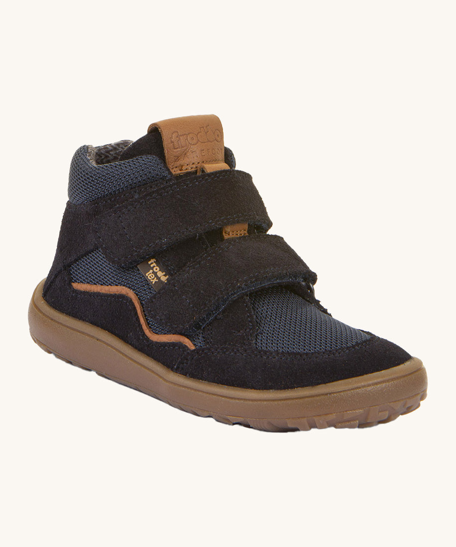 Froddo barefoot Tex Autumn children's shoe in dark blue. A children's waterproof shoe with a 2 velcro fastener on the front for a secure fit, padded ankle and a brown grippy sole.