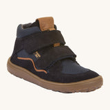 Froddo barefoot Tex Autumn children's shoe in dark blue. A children's waterproof shoe with a 2 velcro fastener on the front for a secure fit, padded ankle and a brown grippy sole.