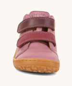 The front of the Froddo barefoot first step baby shoe in pink available at Babipur. Showing the 2 darker pink velcro fastener detail