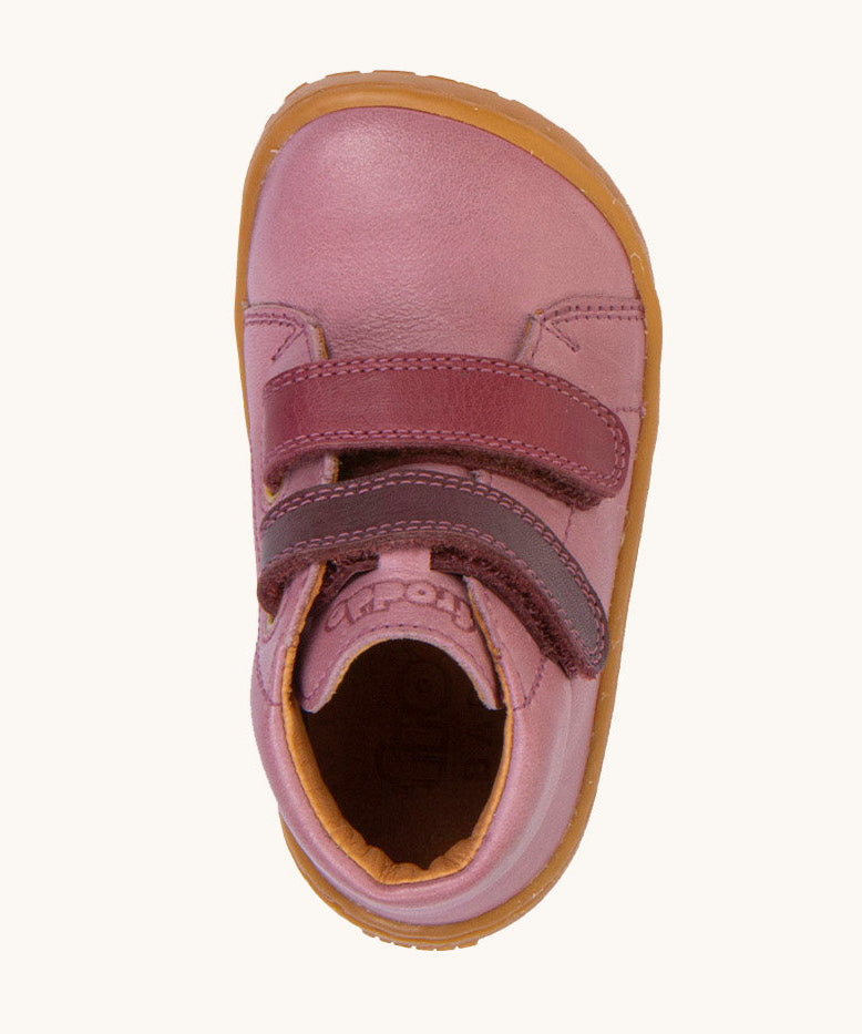 A top down image of the Froddo barefoot first step baby shoe in pink available at Babipur. Showing the velcro strap fasteners and inner sole detail