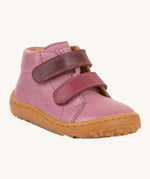 Froddo barefoot first step baby shoe in pink. A natural leather shoe with a 2 darker pink velcro fastener for a secure fit and a light brown grippy sole