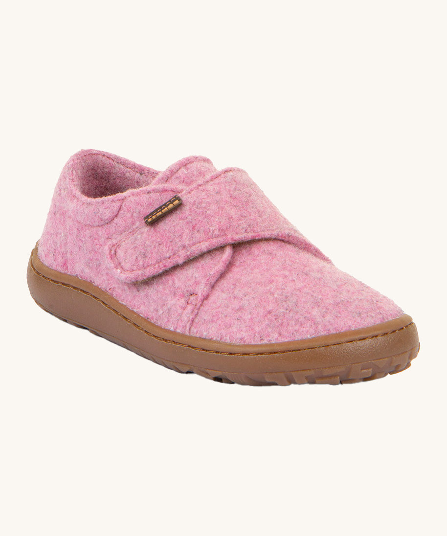 Froddo barefoot wooly children's shoe in pink. A natural wooly shoe with a velcro fastener for a secure fit and a dark brown grippy sole