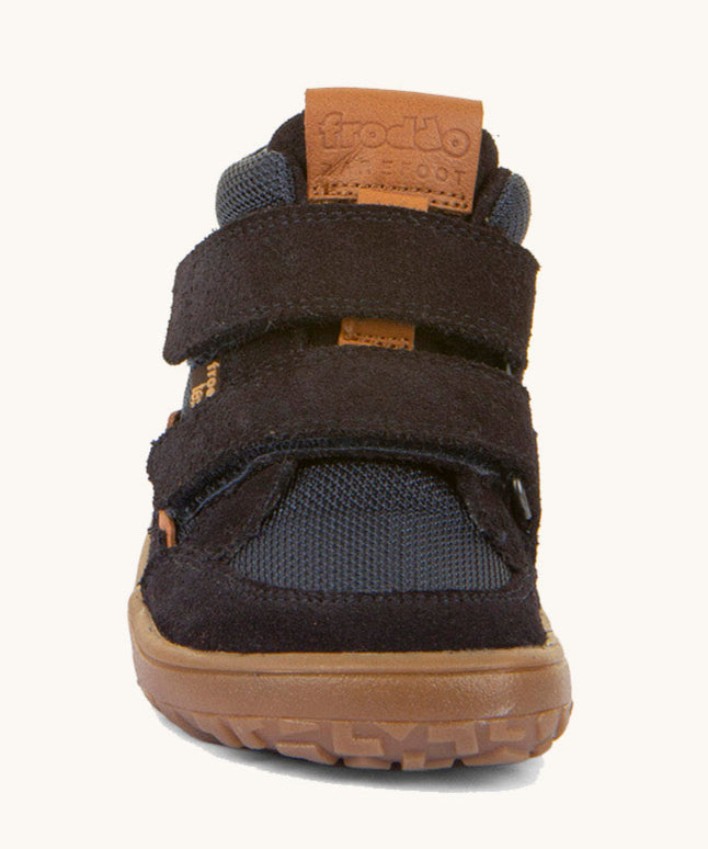 The front of the  Froddo barefoot Tex Autumn children's shoe in navy available at Babipur showing 2 velcro fasteners on the front and the brown grippy sole detail