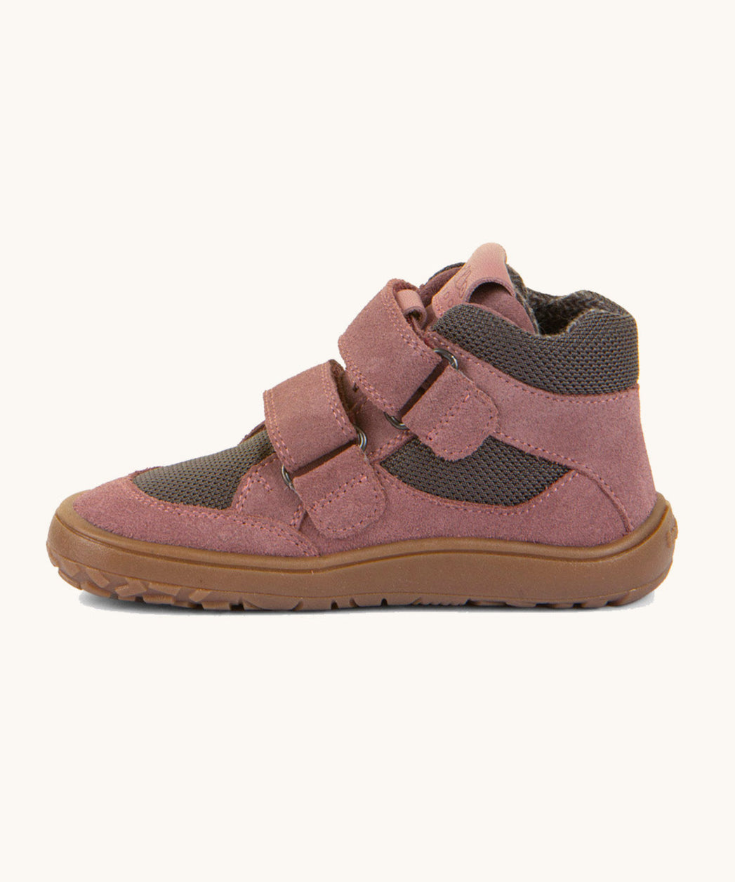 A side image of the Froddo barefoot Tex Autumn children's shoe in pink and grey available at Babipur showing 2 velcro fasteners on the front, padded ankle support and a brown grippy sole.