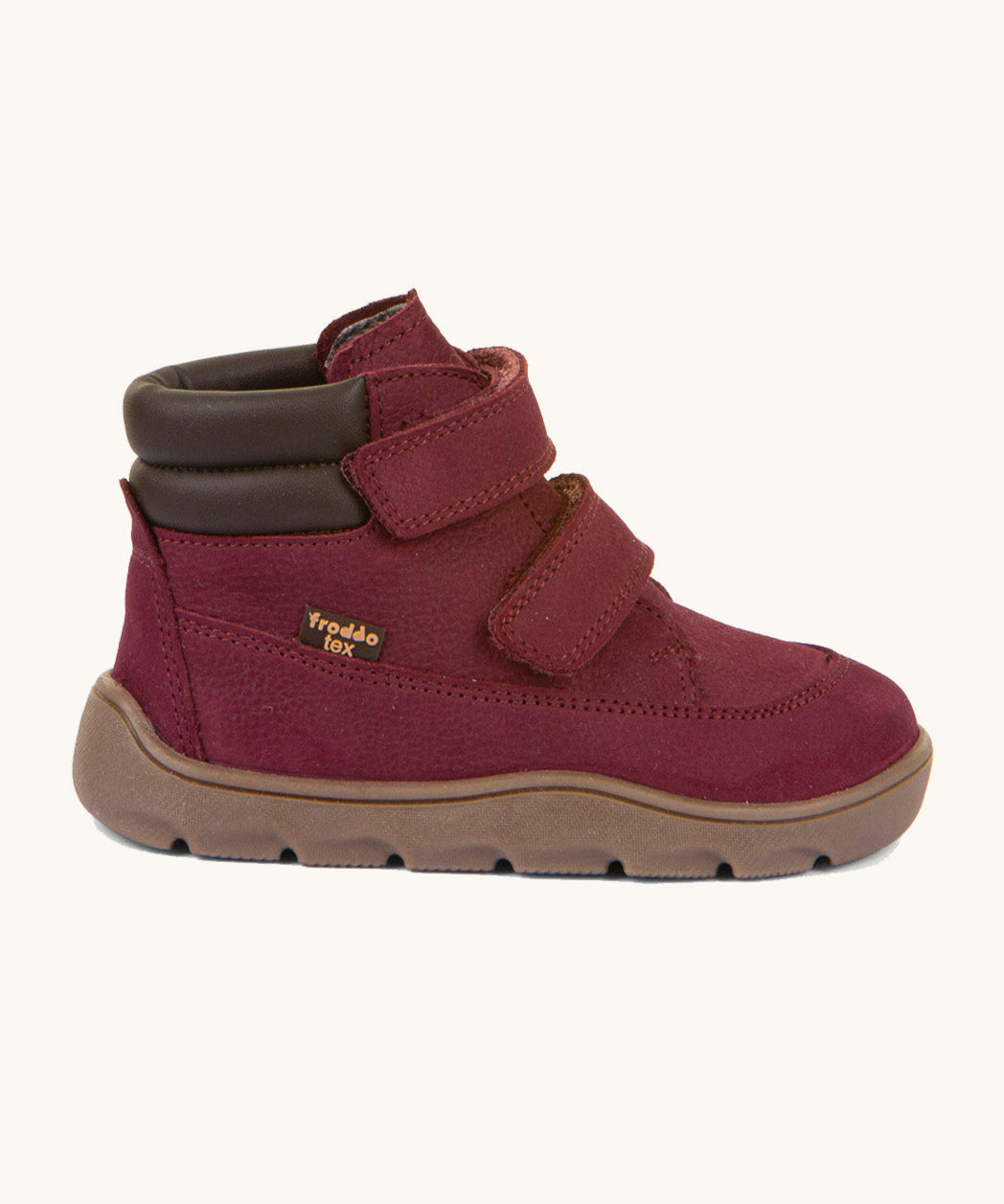 A side image of the Froddo barefoot Zuru tex children's shoe in Bordeau showing the padded ankle and the dark brown grippy sole