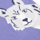A close up of the snow leopard applique on the Frugi Adventure big cats Applique organic cotton long sleeved top. This top features three big cat appliques on a grape purple coloured background. This top is a part of a wide range of organic cotton clothing for children available here at Babipur.