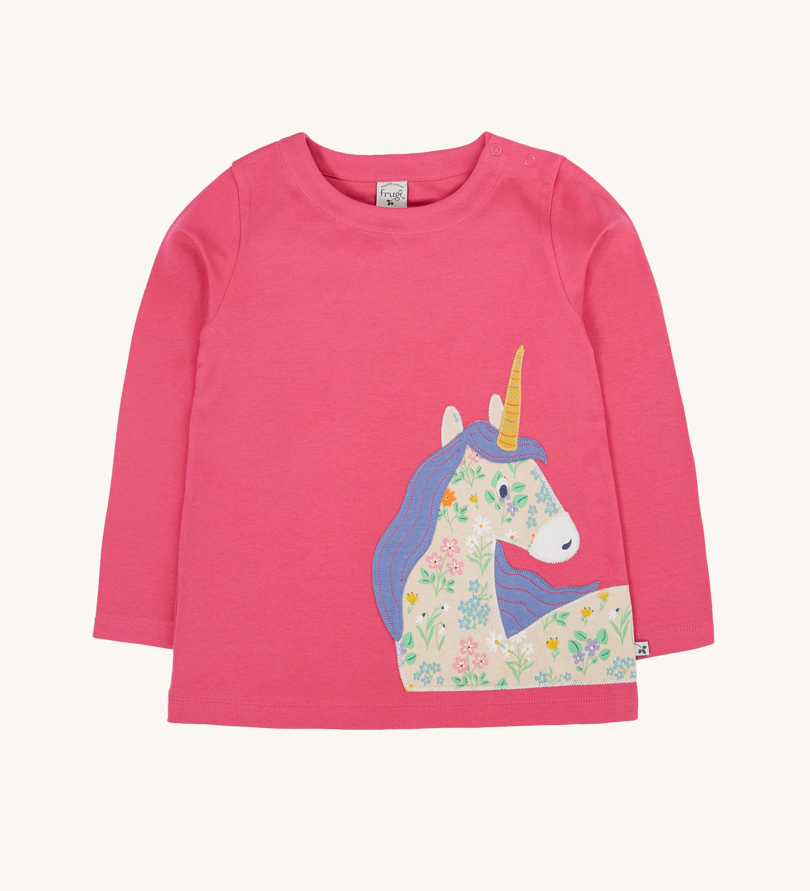 Frugi Rose Pink  Unicorn Anna Circular Organic Cotton Top. A pink coloured long sleeved top with a floral print unicorn applique on the front. This top is a part of a wide range of organic cotton clothing for children available here at Babipur.