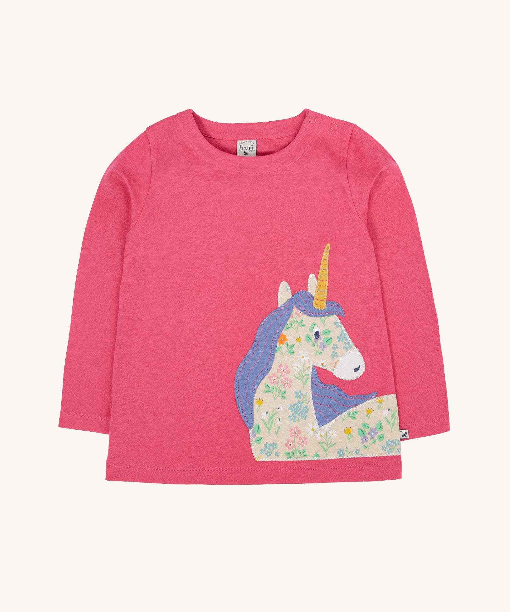Frugi Rose Pink  Unicorn Anna Circular Organic Cotton Top. A pink coloured long sleeved top with a floral print unicorn applique on the front. This top is a part of a wide range of organic cotton clothing for children available here at Babipur.