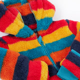 A close up o the Frugi kids recycled cosy snuggle suit in autumn stripe showing the blue zip detail and matching blue cuff on thick warm recycled textile fabric.