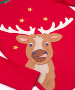 A close up of the reindeer applique on the front of the Frugi Berry Red Reindeer Terrific Circular Organic Cotton long sleeved kids Top. A red coloured children's top with a festive reindeer applique and gold stars on the front. This top is a part of a wide range of organic cotton clothing for children available here at Babipur.