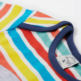 A close up of Frugi Bobster Applique T-Shirt in a Sea Rainbow Stripe print, featuring popper fastenings.