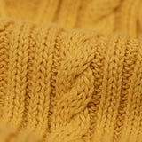 A close up of the cable knit sleeves on the Frugi Caleb leopard Character Knit Organic Cotton Kids' Jumper. This knitted jumper is a part of a wide range of organic cotton clothing for children available here at Babipur.