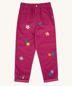 Frugi children's callie paperbag style with a damson colour and flora design.