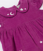 A close up of the embroidered moon and stars details on teh collar of the Frugi Damson purple Flowers Organic Cotton Vali Corduroy children's Dress. This cord kids dress is a part of a wide range of organic cotton clothing for children available here at Babipur.