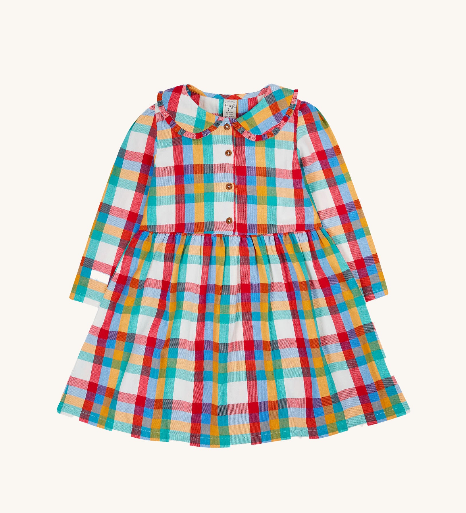 Frugi Rainbow Check Organic Cotton Ffion Dress. The dress has a rounded collar details and button closure on the front. This festive kids dress is a part of a wide range of organic cotton clothing for children available here at Babipur.
