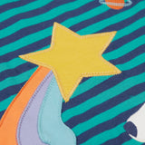 A close up of the yellow star applique on the front of the Frugi Polar Bear Discovery Circular Organic Cotton long sleeved kids Top.  This top is a part of a wide range of organic cotton clothing for children available here at Babipur.