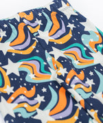 A close up of the Frugi Magic Skies Organic Cotton Cosy Flared Leggings. These warm cotton leggings are lined with a Brushback Fleece surface inside. These leggings are part of a wide range of organic cotton clothing for children available here at Babipur.