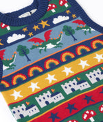 A close up of the front of the Frugi Dragon Fair Isle Organic Cotton Knitted Sweater Vest. A colourful design featuring dragons, rainbows, clouds, stars, toadstools and castles. This sweater vest is a part of a wide range of organic cotton clothing for children available here at Babipur.