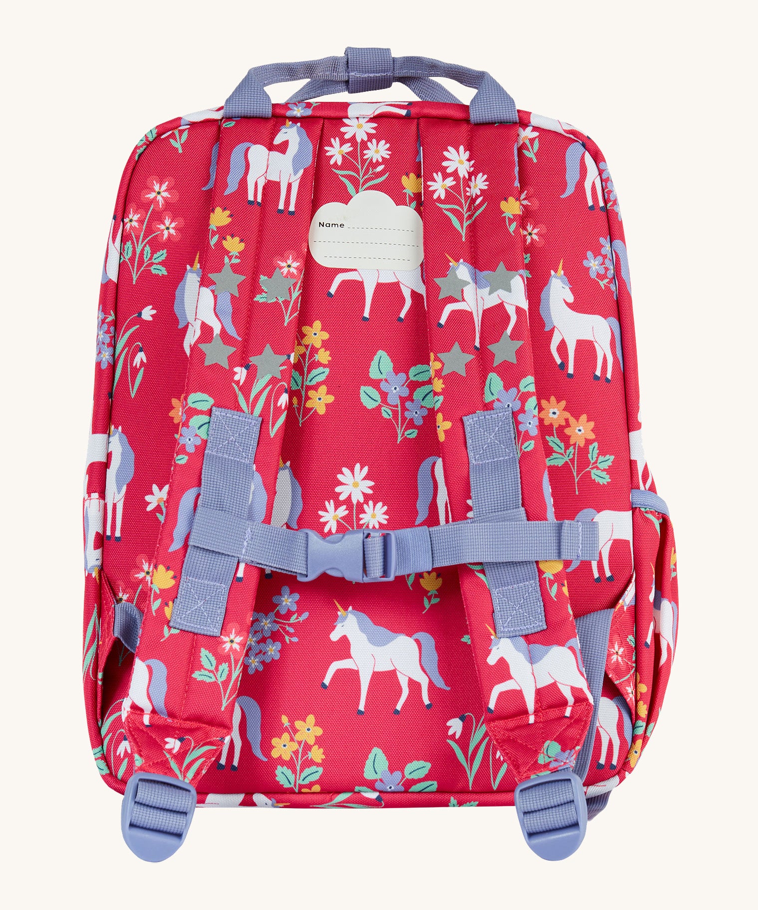 The back of the Frugi rose unicorn explorers backpack. Features a strap with buckle connecting the two shoulder straps for a secure fit and handy carry handle on top