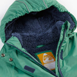 A close up of the Frugi kids snow and ski coat in green with a mountain scene print. Showing the thick navy fleece inner on the hood and zip detail