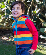 A child wearing the Frugi Autumn stripe inspired fleece gilet from the Autumn stripe/navy waterproof rambler 3 in 1 coat.   A thick warm fleece with light blue trim and a full length zip