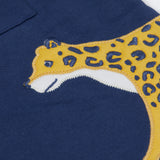 A close up of the yellow cheetah applique on the side of the Frugi Big Cats Navy Organic Cotton Cosy Kids' Shirt Shaket. This shaket has a tiger and cheetah applique details on the sides. This navy shirt jacket is a part of a wide range of organic cotton clothing for children available here at Babipur.