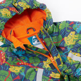 A close up of the Frugi kids be hoppy puddle buster coat showing the multicoloured frogs on navy waterproof material. Features a full length zip and velcro fasteners for a secure fit.