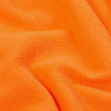 A close up of the orange fleece inside liner on the be hoppy Frugi puddle buster coat for warmth.