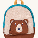 Frugi kids beary wild backpack. A blue and neutral colour fleece type with a corduroy character bear as a front pocket. Features a handy yellow carry handle on the top