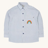 Frugi kids shacket, shirt with blue and white stripes and rainbow design on a cream background.