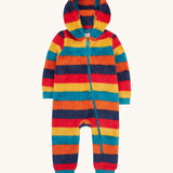 Frugi kids recycled cosy snuggle suit in autumn stripe available at babipur. A recycled textile all in one suit in a autumn inspired design. Features a warm cosy hood and a blue full length zip with matching blue cuffs.