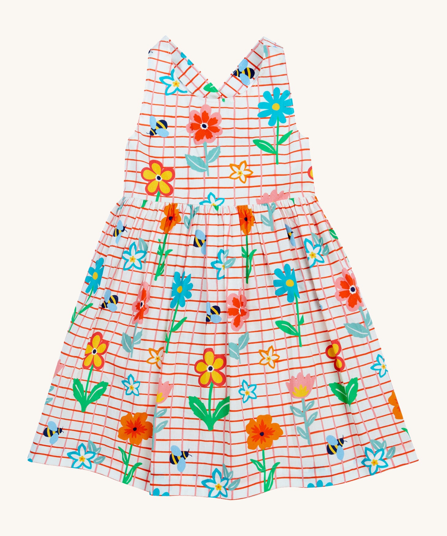 Frugi kids Delpi paint a floral dress - GOTS organic cotton kids dress with white check and red outline, sleeveless with a back strap fasteners. Features prints of different coloured flowers and bees.