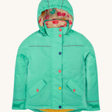 Frugi kids 3 in 1 rambler coat in dragon/mushroom colourway. A bright turquoise waterproof coat from post consumer recycled polyester. Features a removable hood and 2 side pockets with different colour poppers