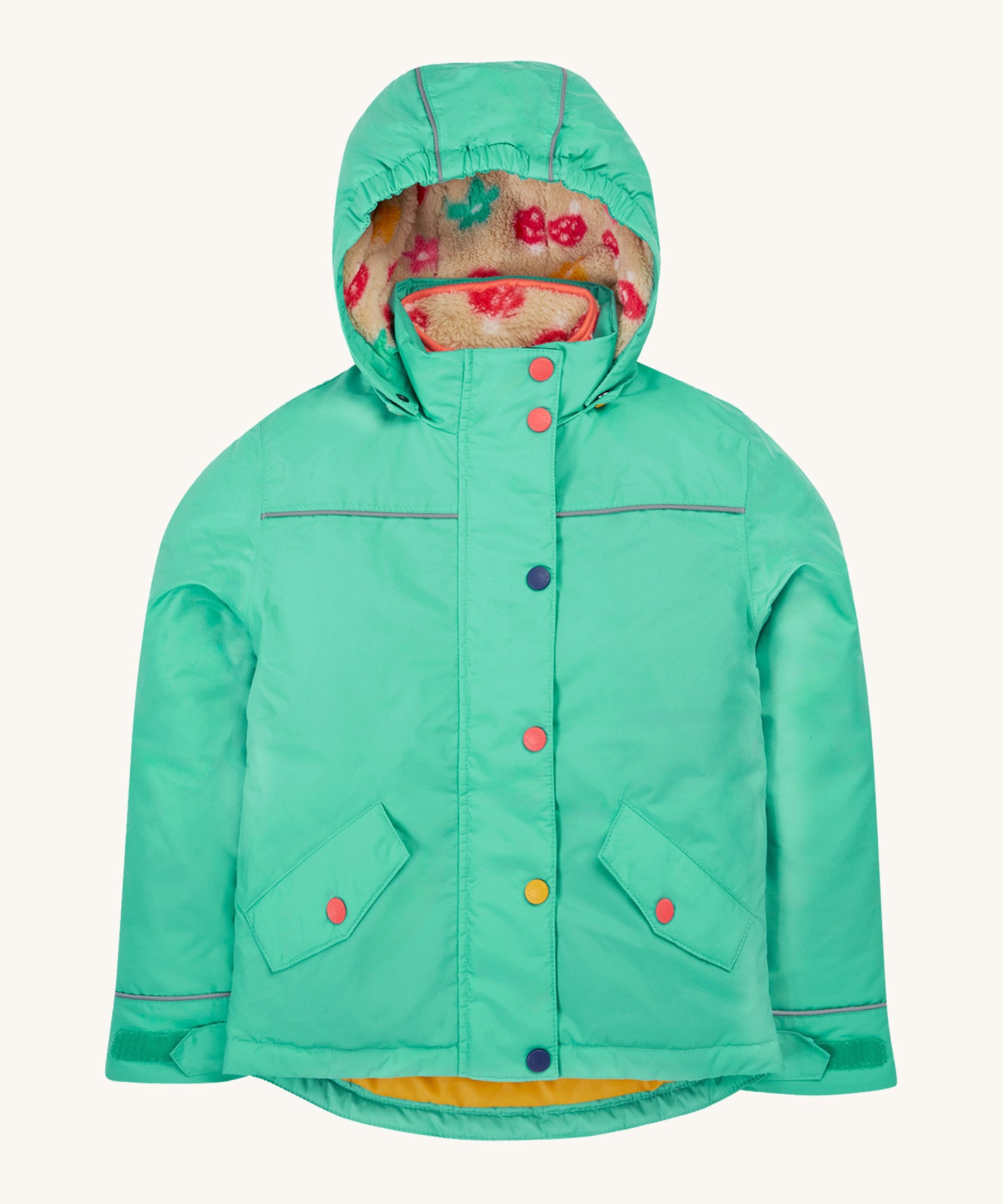 Frugi kids 3 in 1 rambler coat in dragon/mushroom colourway. A bright turquoise waterproof coat from post consumer recycled polyester. Features a removable hood and 2 side pockets with different colour poppers