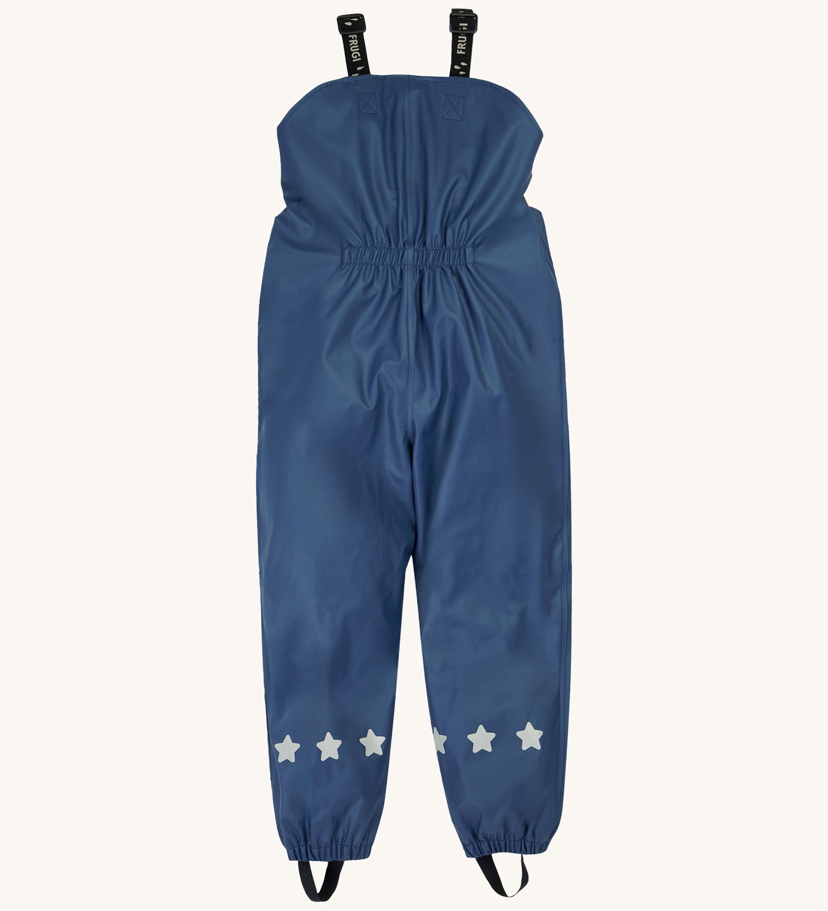 Frugi kids puddle buster trousers in navy / panda showing the back elastic detail for a snug fit. Features reflective stars on the bottom of each leg on navy waterproof material
