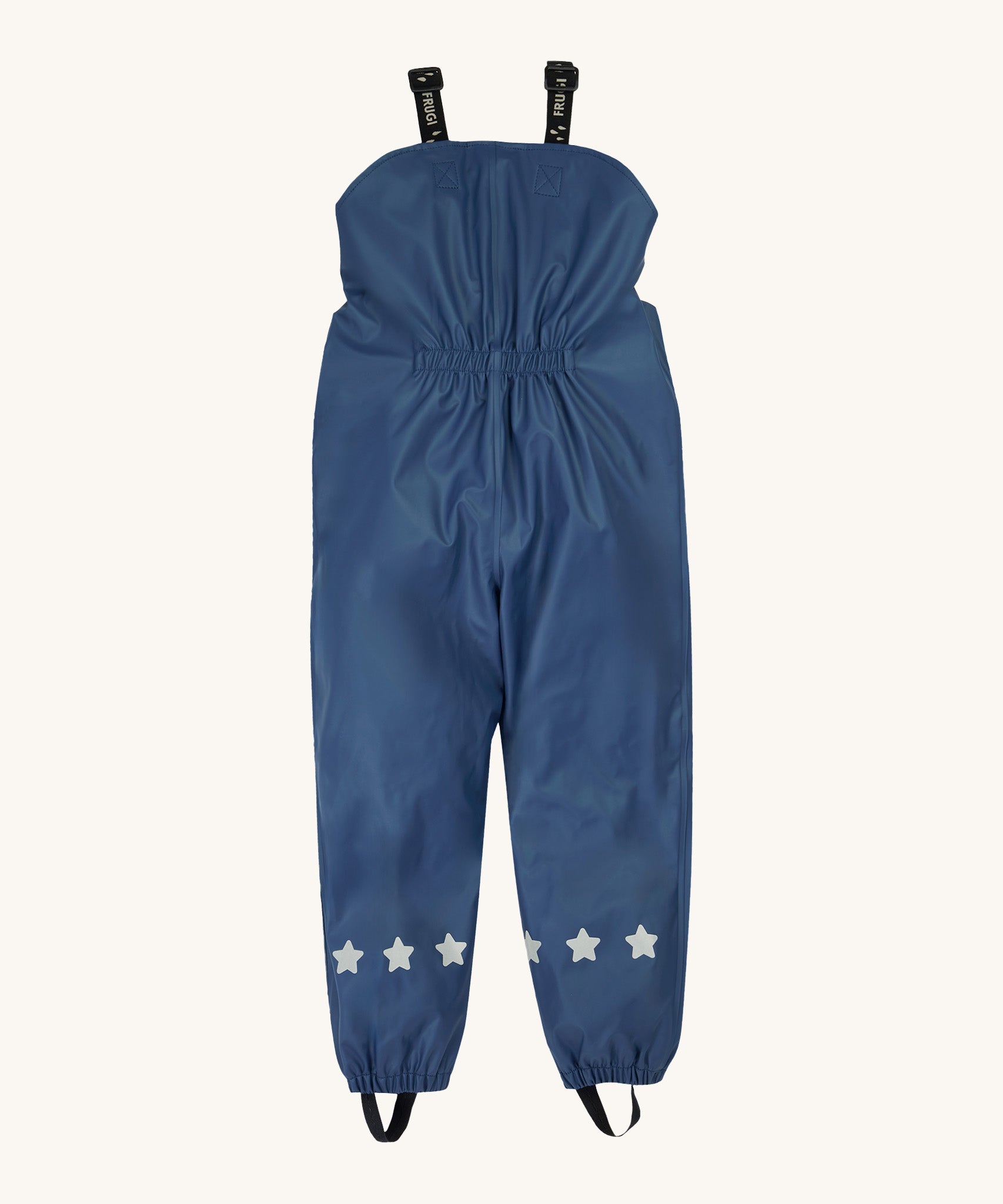 Frugi kids puddle buster trousers in navy / panda showing the back elastic detail for a snug fit. Features reflective stars on the bottom of each leg on navy waterproof material