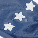 A close up of the reflective stars on the  Frugi navy panda puddle buster waterproof trousers available at Babipur.
