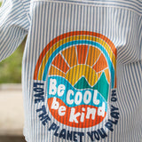 Frugi kids shacket, shirt with blue and white stripes and rainbow design worn by a child back detail