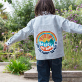 Frugi kids shacket, shirt with blue and white stripes and rainbow design worn by a child