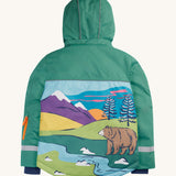 The back of the Frugi kids snow and ski coat in green with a mountain scene. Showing a sketch style mountain scene in bright colours on the bottom back of the coat.