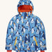 Frugi kids snow and ski coat in penguin waddle. A light blue thick recycled polyester coat with a padded orange inner. Features a hood, 2 side pockets, extendable arm cuffs with reflective strips