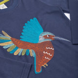 A close up of the embroidery on the front of the Frugi navy kingfisher Organic Cotton Embroidered long sleeve children's Top. This top is a part of a wide range of organic cotton clothing for children available here at Babipur.