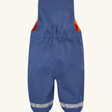 The back of the Frugi little kids waterproof navy dungarees showing the elasticated band for a snug fit and leg cuff detail.