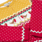 A close up of the front of the Frugi Festive Fair Isle Organic Cotton Kids' Carol Cardigan featuring red, yellow and green patterns and robin redbreast details. 
This knitted cardigan is a part of a wide range of organic cotton clothing for children available here at Babipur.