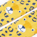 A close up of the leopard face on the knees of the Frugi Organic Cotton Norah Leopard Knitted Tights. These tights are part of a wide range of organic cotton clothing for children available here at Babipur.