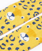 A close up of the leopard face on the knees of the Frugi Organic Cotton Norah Leopard Knitted Tights. These tights are part of a wide range of organic cotton clothing for children available here at Babipur.