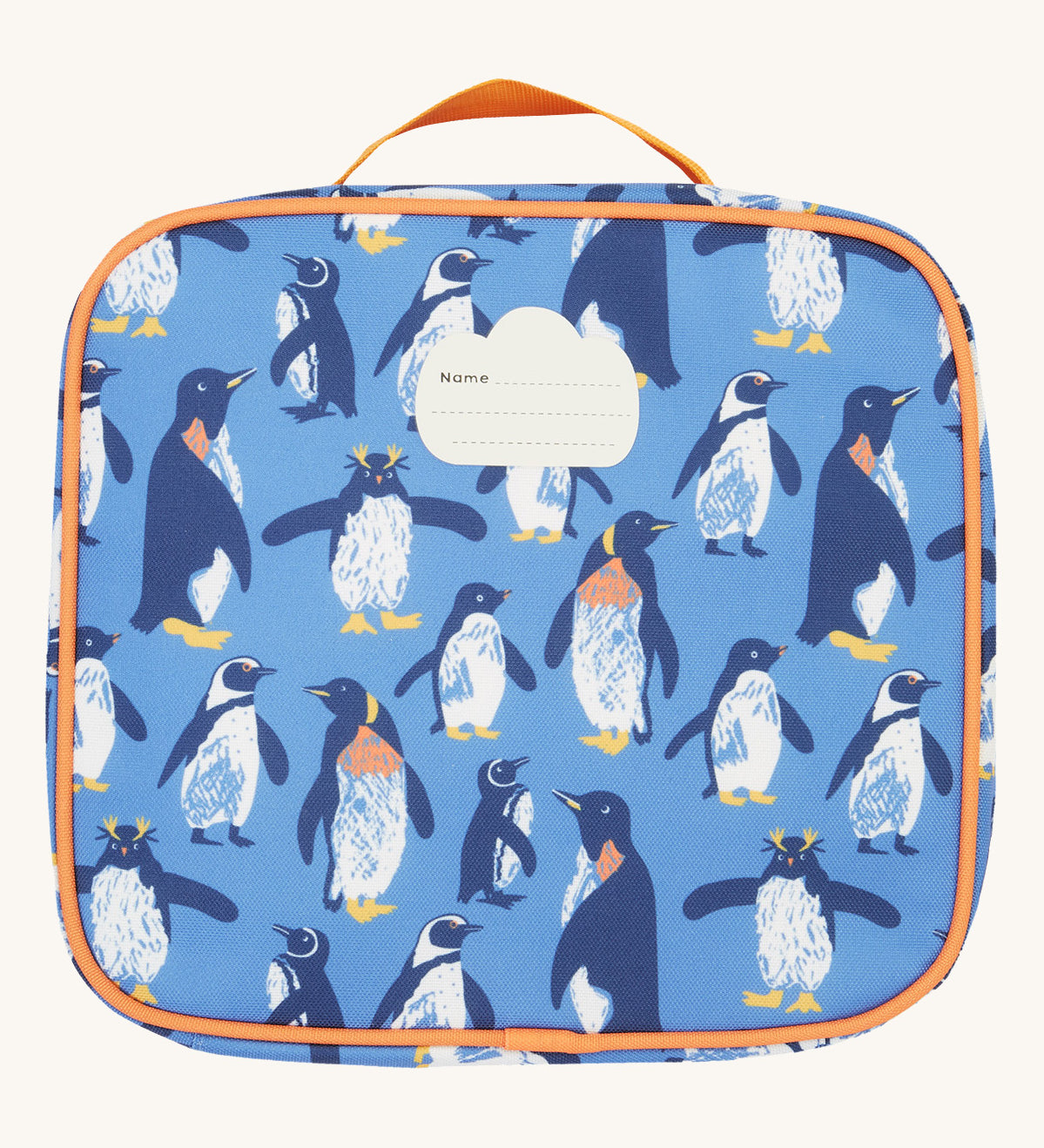 The back of the Frugi kids pack a lunch bag in penguin waddle showing the name tag patch on the top and orange carry handle detail