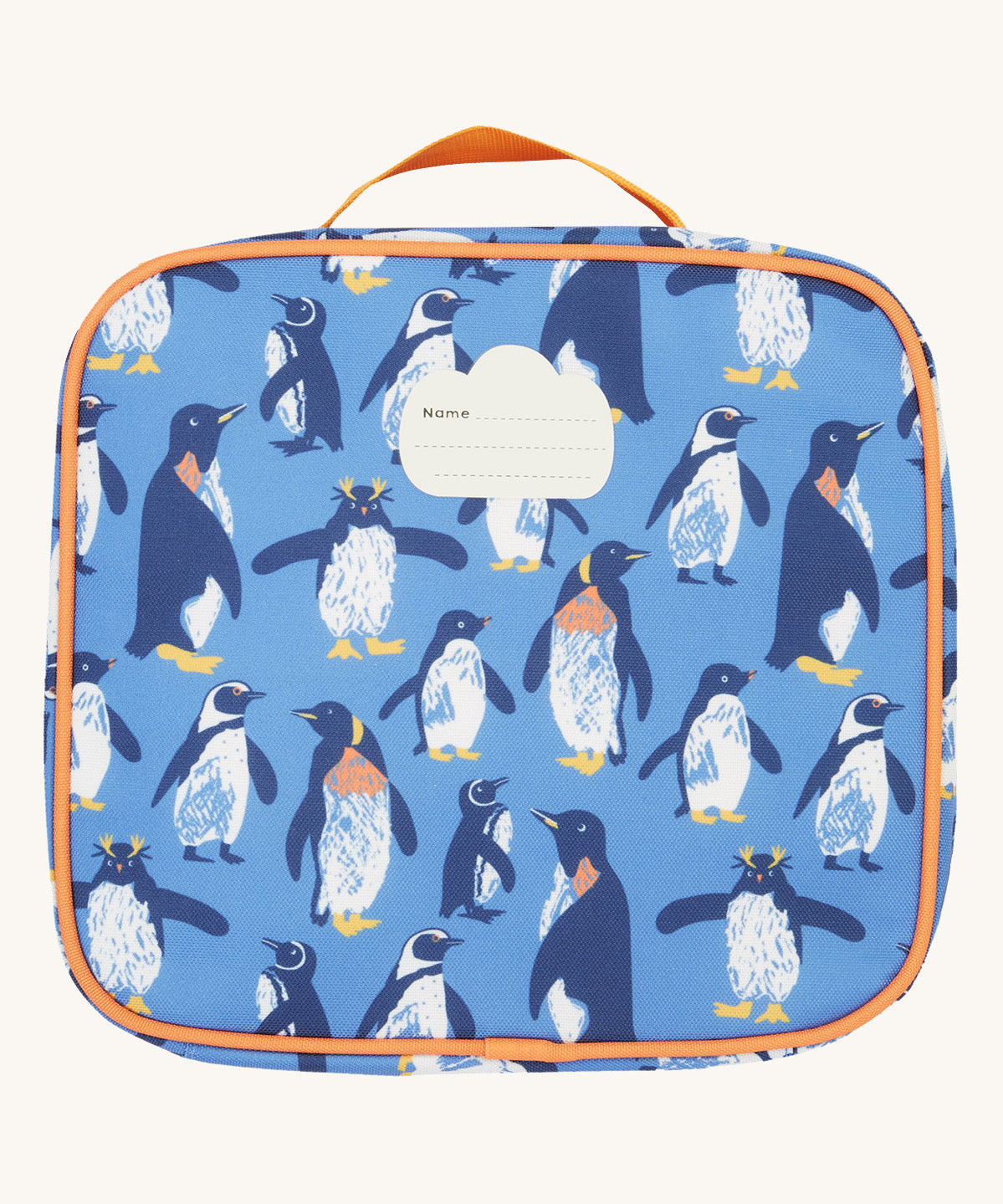 The back of the Frugi kids pack a lunch bag in penguin waddle showing the name tag patch on the top and orange carry handle detail