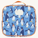 The back of the Frugi kids pack a lunch bag in penguin waddle showing the name tag patch on the top and orange carry handle detail